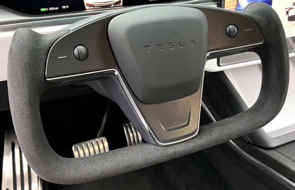 Tesla Model S has a yoked steering wheel.