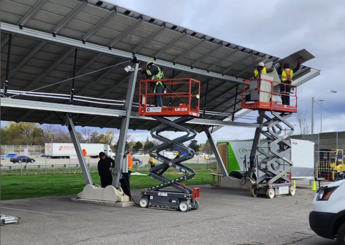 Pioneering new solar panel installation procedures as we assemble solar carport