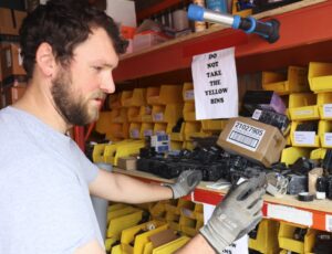 Tim doing electrical maintenance and troubleshooting